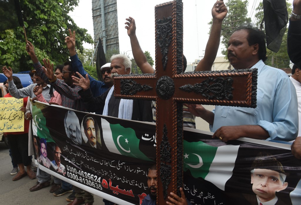 رپورٹ میں کہا گیا ہے کہ پاکستان میں اقلیتوں کے ساتھ نامناسب سلوک رواں رکھا جاتا ہے فوٹو اے ایف پی